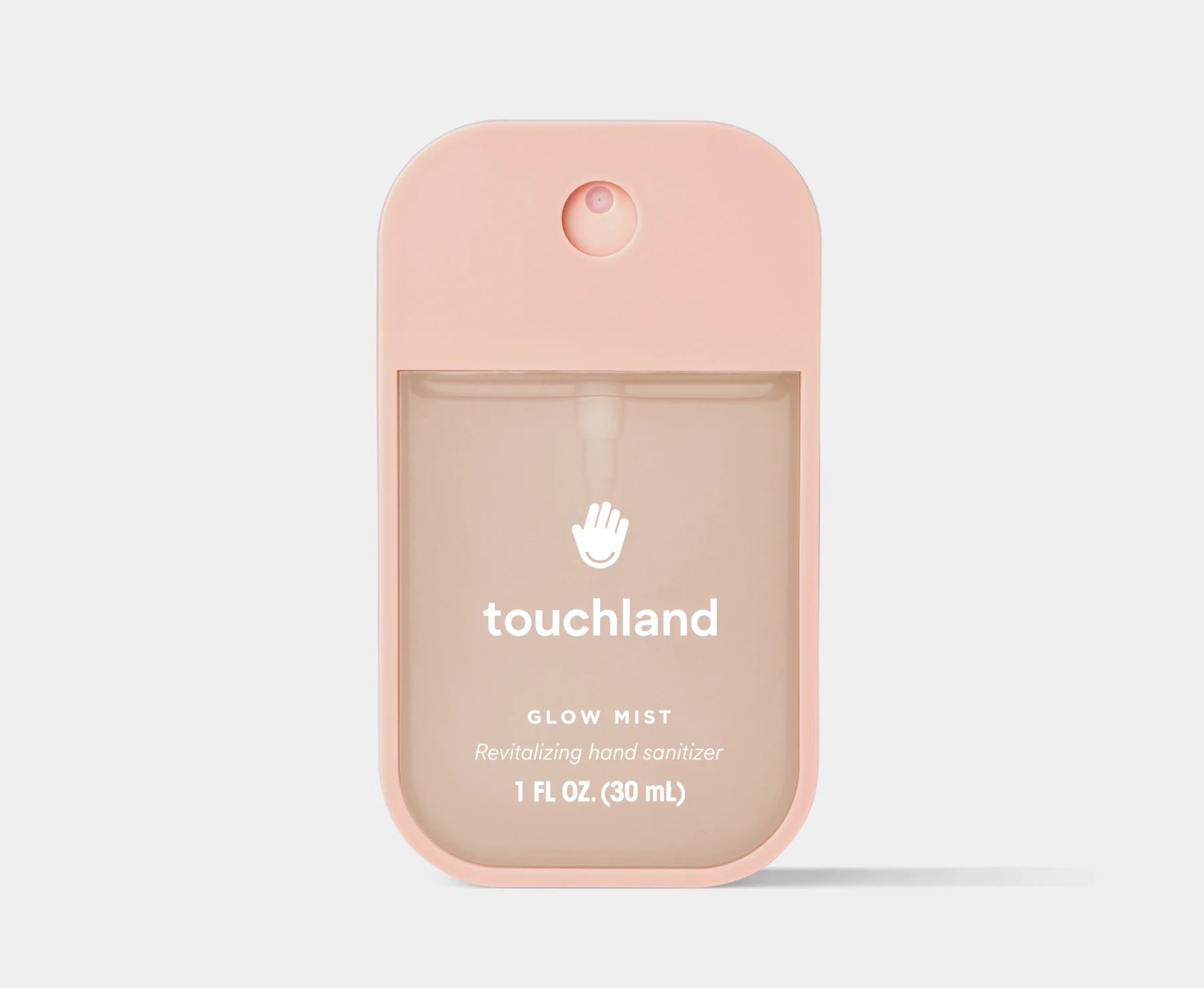 Pink hand sanitizer container with 'touchland' branding on a light gray background